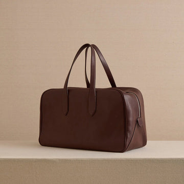 Chocolate Brown Leather Weekender Bag with Zip Closure and Rolled Handles for Daily Travel Matching